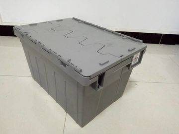 Les poubelles de stockage en plastique jaunes ont attaché des couvercles empilés pour le transport