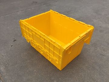 Les poubelles de stockage en plastique jaunes ont attaché des couvercles empilés pour le transport